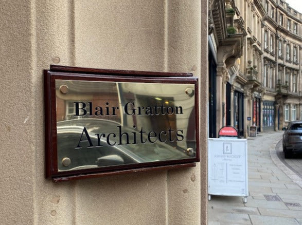 Custom engraved brass plaque example, personalised wall-mounted design